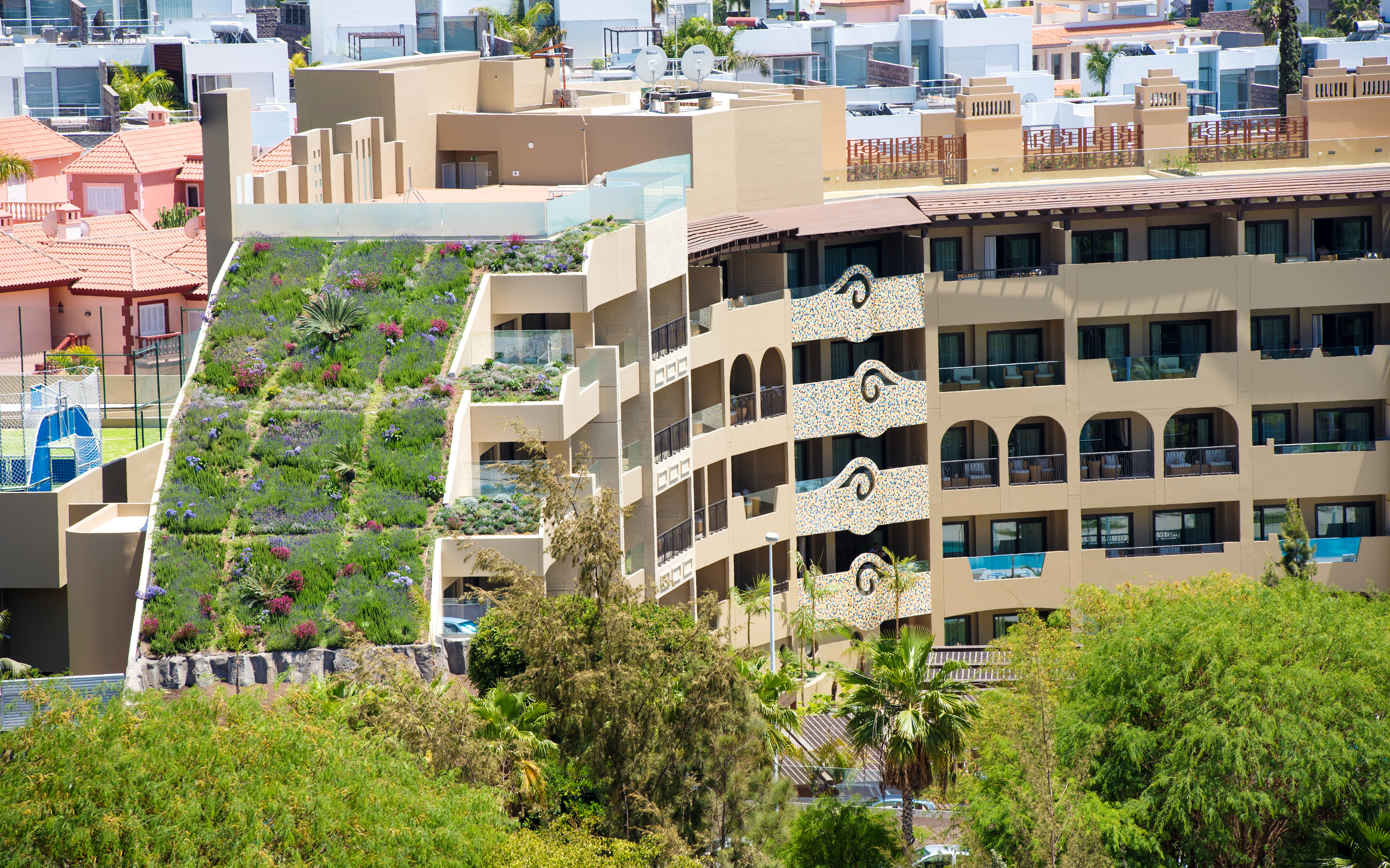 Hotel building with steep pitched green roof