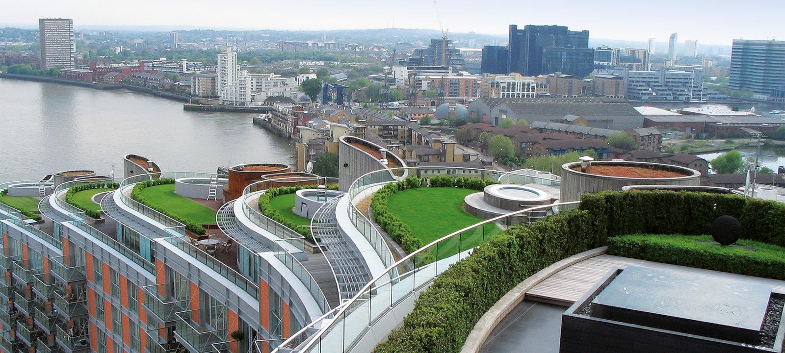 Terraced roof gardens with lawn and small swimming pools