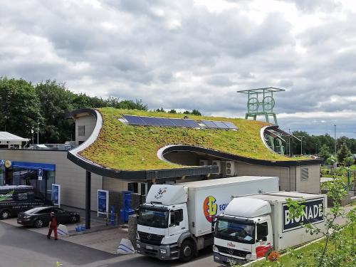 Curving green roof of a motorway service station