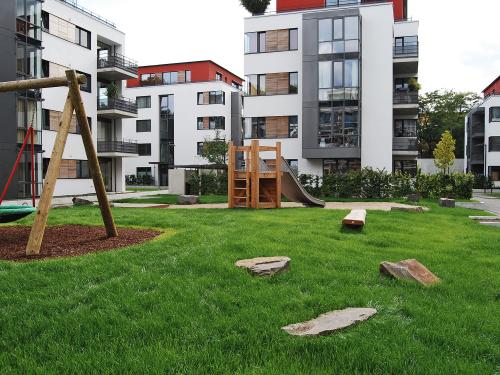 Residential complex with lawn and playground