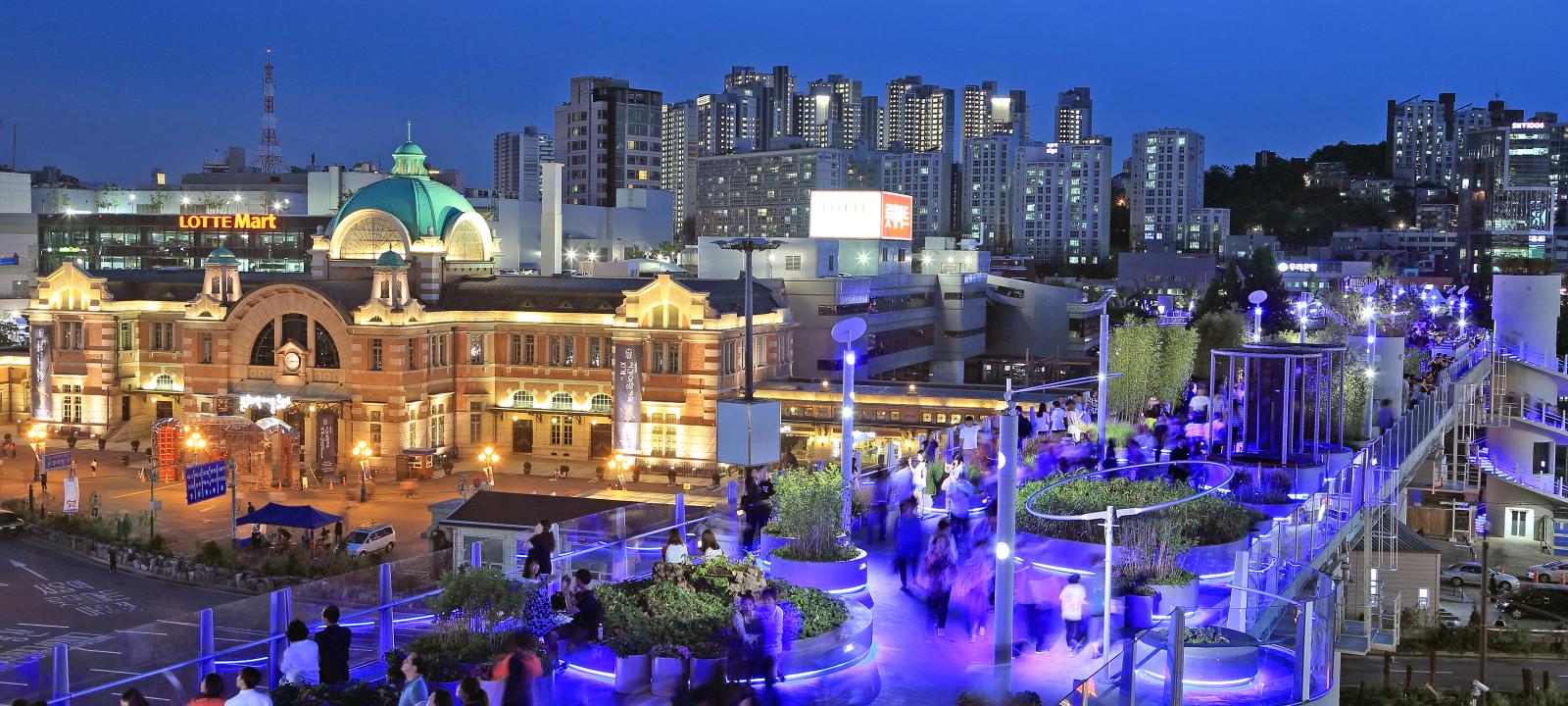 Illuminated roof garden in the city at night